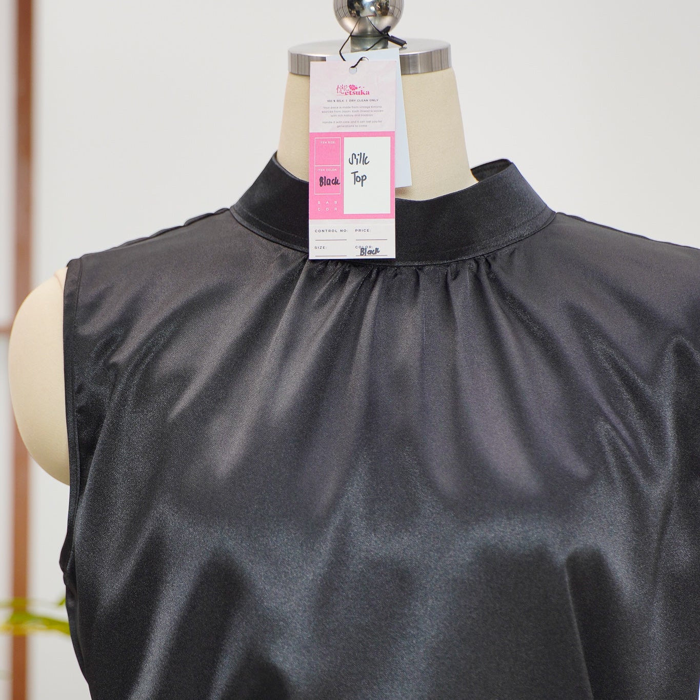 On-hand item: Black Silk Cotton Turtleneck top